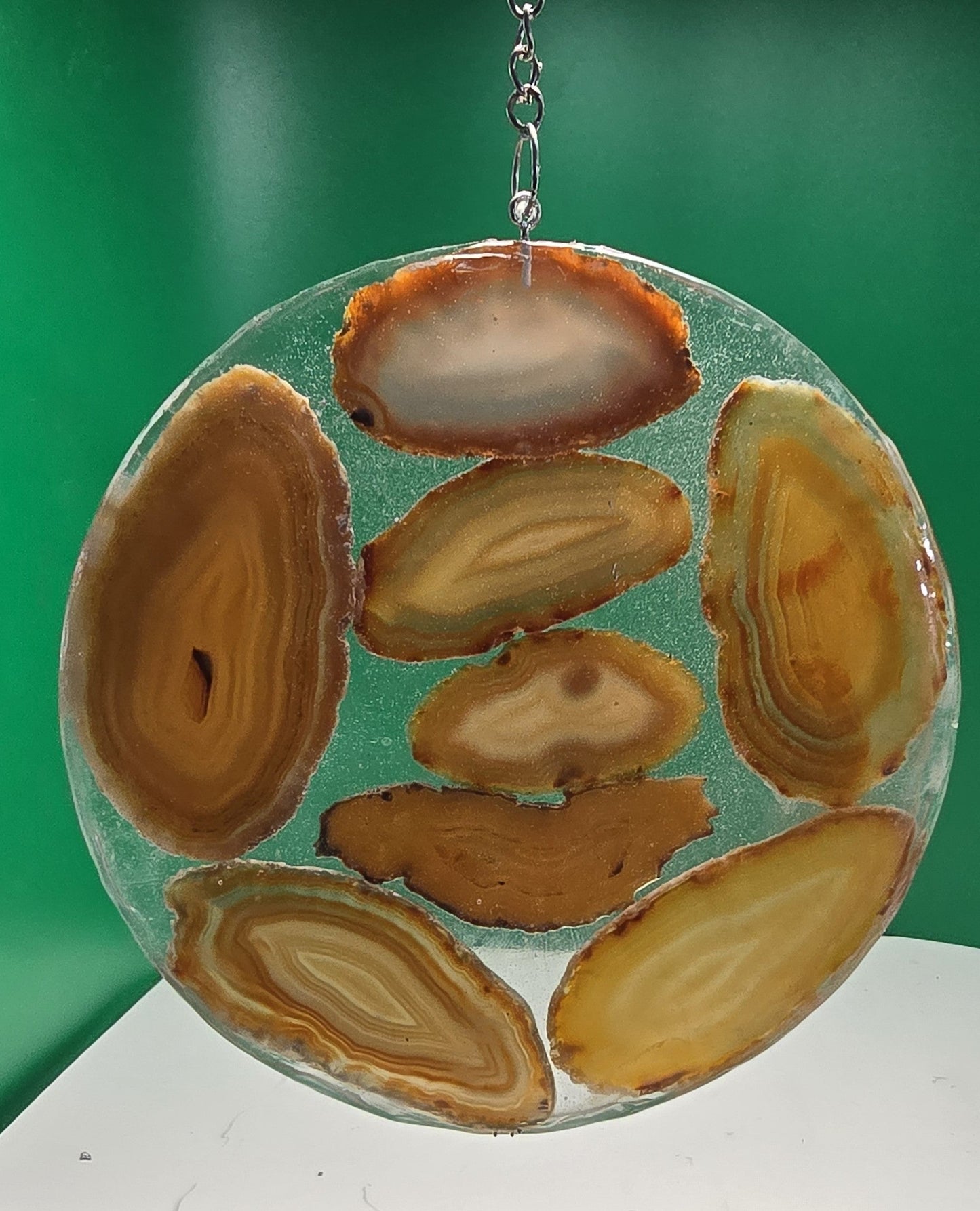 Natural tan colored agate slices in resin