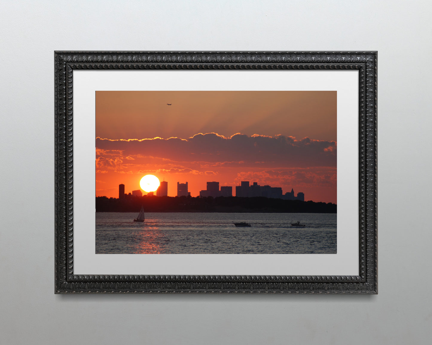 Boston skyline at sunset from Hull