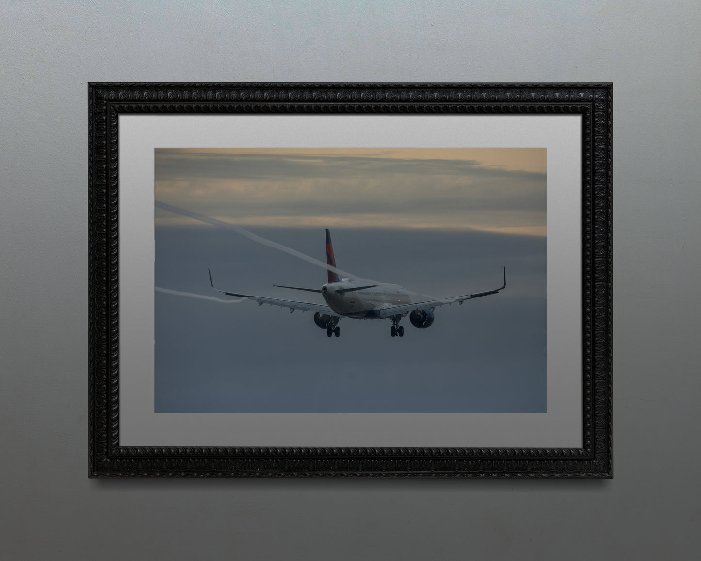 Delta Landing with vapor trails Bayswater